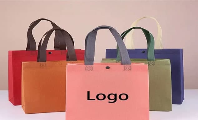 Colourful non woven bags with a printed logo