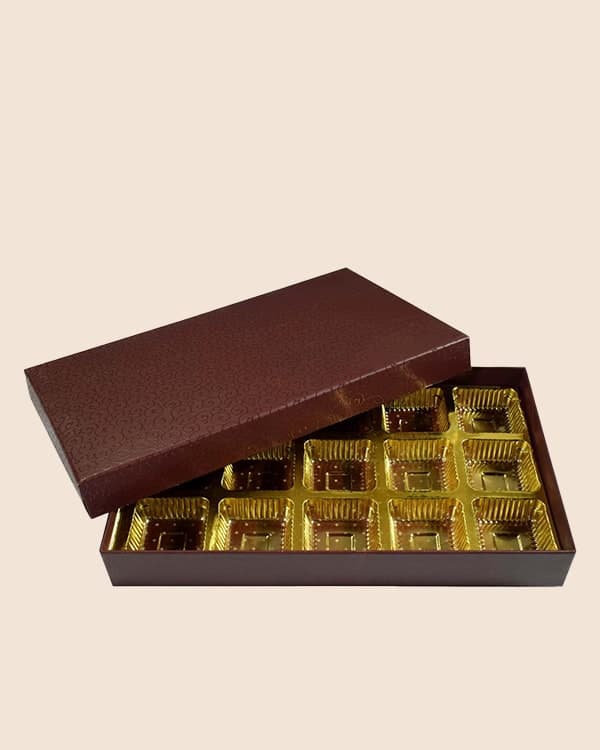 Brown chocolate box with gold cavity tray